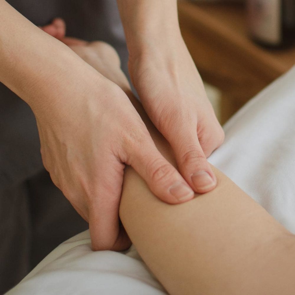 Photo of someone getting an arm massage and manual lymphatic drainage